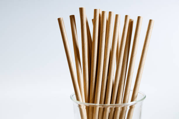istock Brown paper straws in glass 1168544857