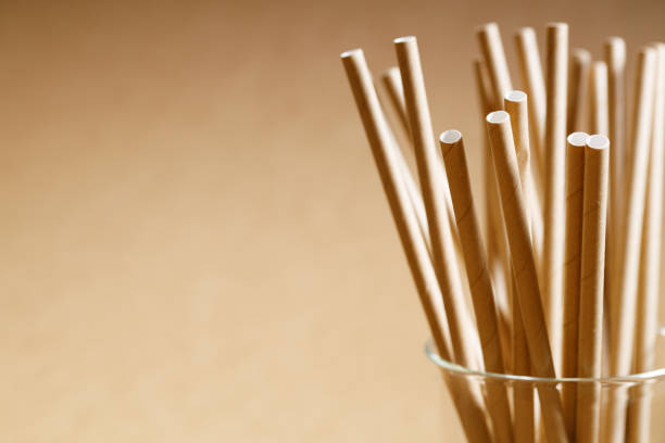 istock Brown paper straws in glass 1168544858