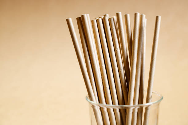 istock Brown paper straws in glass 1168544860