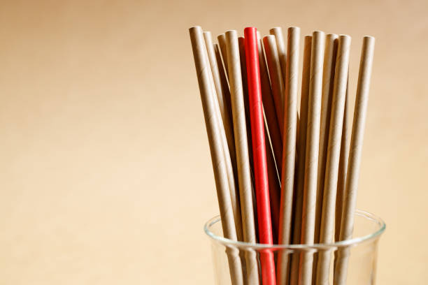 istock Brown paper straws in glass 1168544873