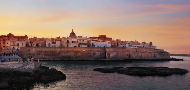 istock Sunset panorama of Monopoli harbor in Apulia, Italy 1168547430