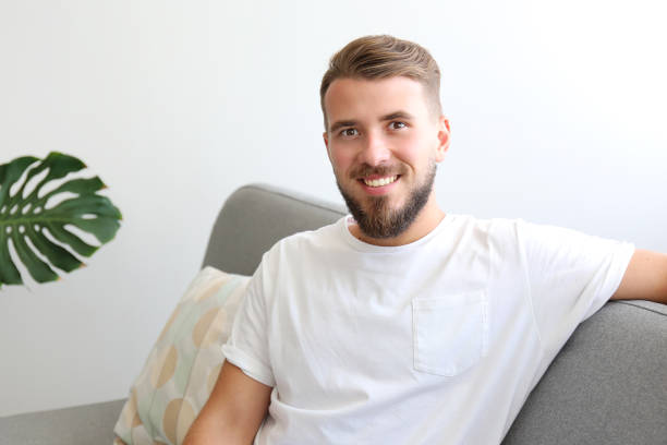istock Young man with full beard chilling in his apatrment. 1168547483