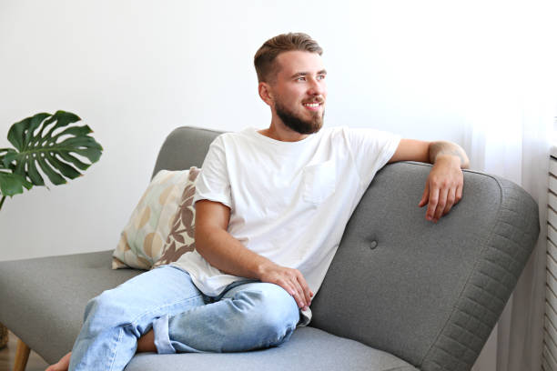 istock Young man with full beard chilling in his apatrment. 1168547489