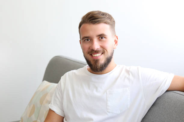 istock Young man with full beard chilling in his apatrment. 1168547642