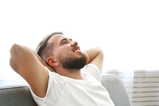 istock Young man with full beard chilling in his apatrment. 1168547649