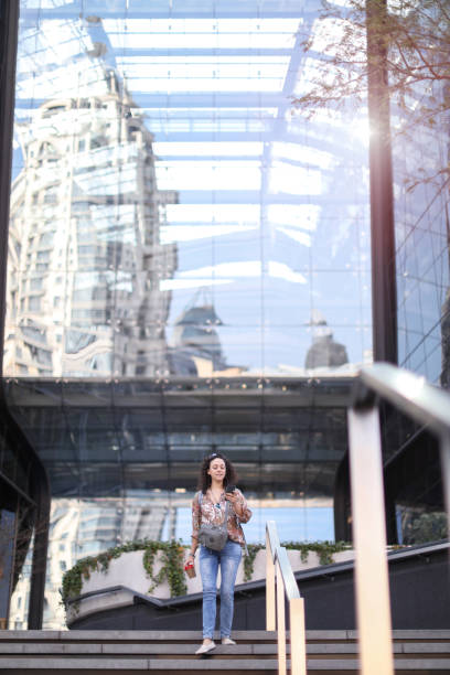 istock a Young woman exploring a new city. 1168550432