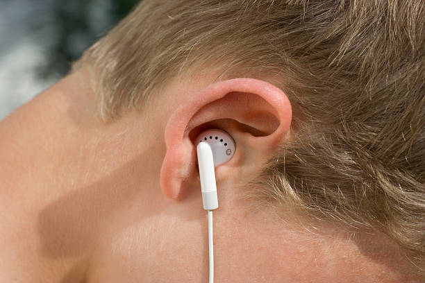 istock teen with earphones 116855249