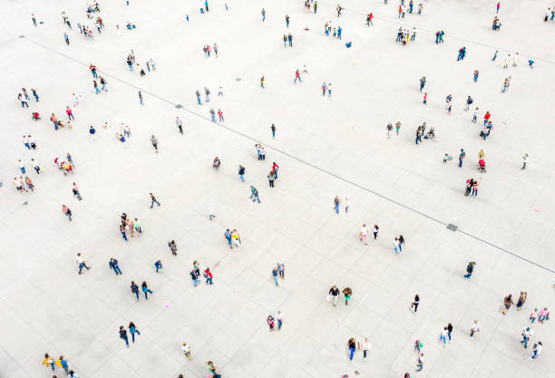 istock High Angle View Of People On Street 1168553893