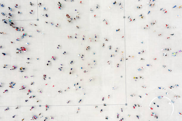 istock High Angle View Of People On Street 1168553926