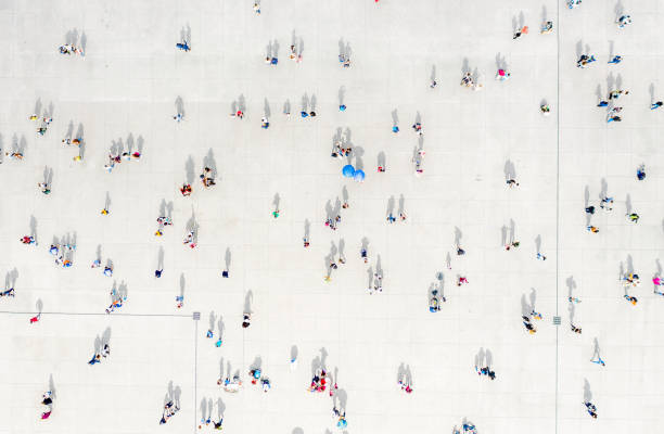istock High Angle View Of People On Street 1168556472