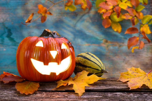 istock autumn decoration with pumpkin and leaves 1168557357