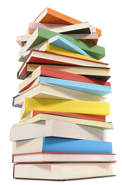 Very tall stack of colorful books Very tall pile of colorful books shot from a low angle.  I am building quite a collection of colorful books. If you’d like to see my complete collection please  CLICK HERE.  Alternative version of this file shown below: handbook book hardcover book red stock pictures, royalty-free photos & images