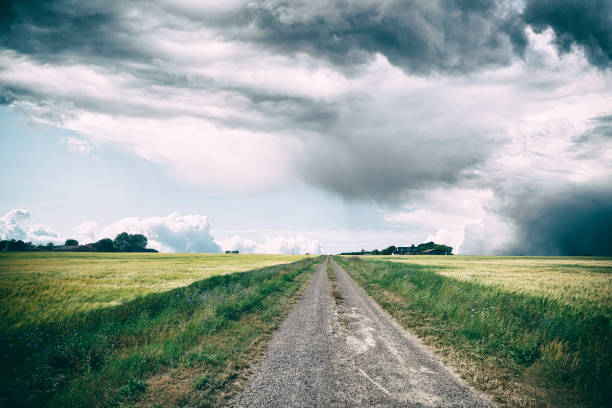 istock Rural landscape with dark clouds over a countyside 1168564649