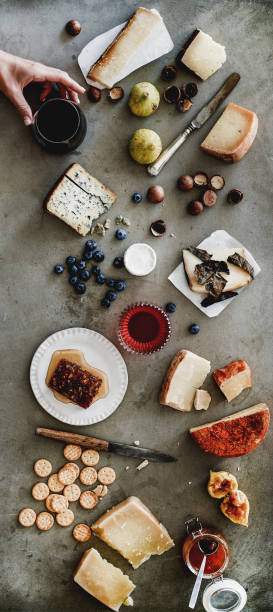 istock Wine and snack variety over grey backgorund, narrow composition 1168564650