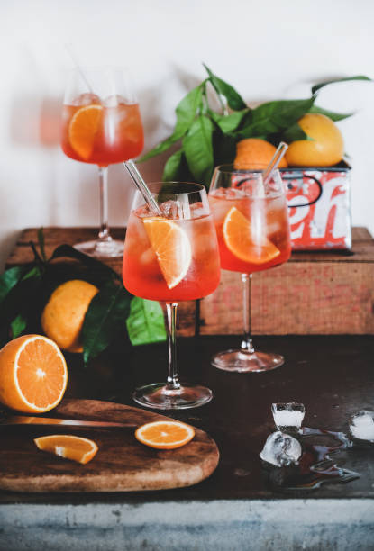 istock Spritz aperitif drink in glasses with oranges and ice 1168564758
