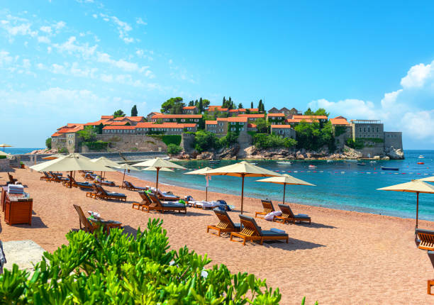 Beach at Sveti Stefan Island Beach near the island of Sveti Stefan Hotel montenegro stock pictures, royalty-free photos & images