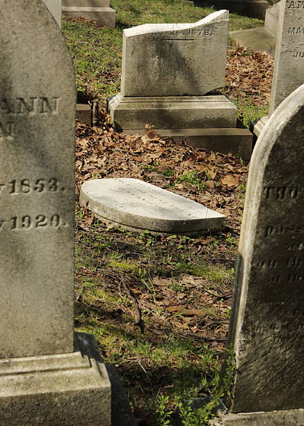 istock Cemetery Graves Tombstone Damage 116857015