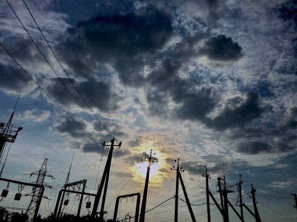 istock Transformer substation with power lines, pylons. 1168570554