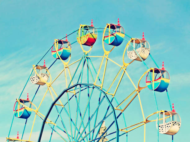 istock Ferris wheel carousel on blue sky backround. 1168570760