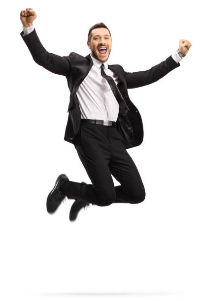 istock Young businessman jumping in excitement 1168579279