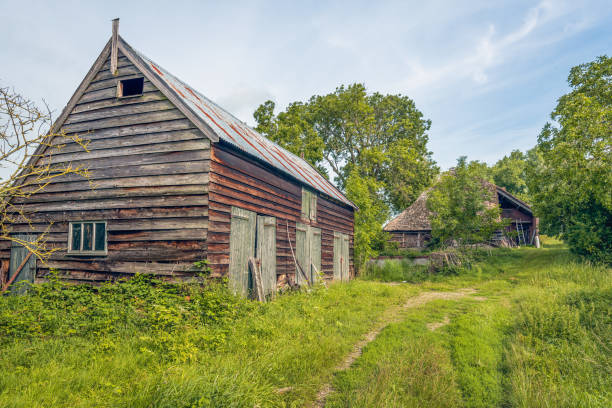 istock Old and dilapidated wooden barns 1168579595