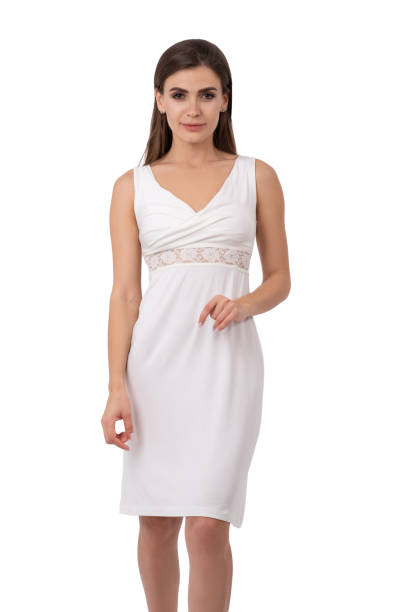 istock Seductive brunette woman standing in nightie isolated 1168580989