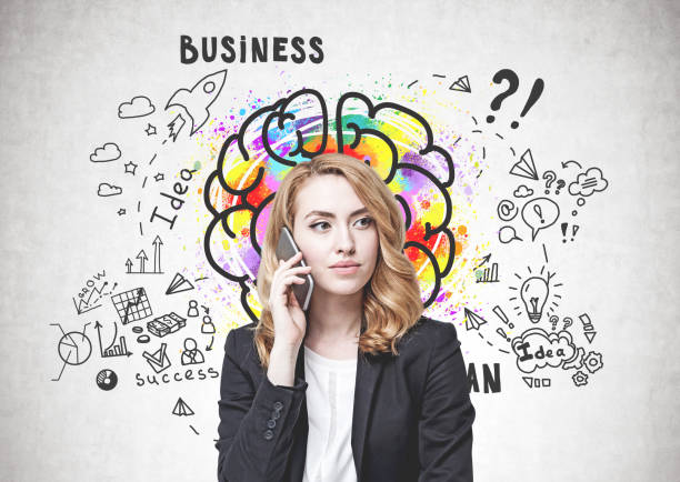 istock Serious ginger woman on phone, business idea 1168581130