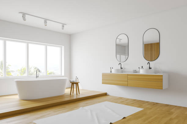 istock White bathroom corner with tub and sink 1168581259