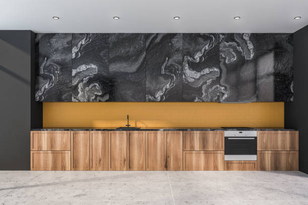 istock Black marble and yellow kitchen with countertops 1168582743