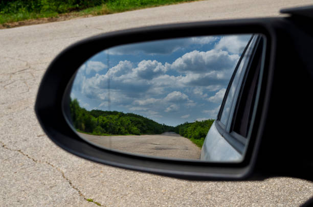 istock Side rear-view mirror in the morning on the road 1168586743