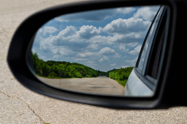istock Side rear-view mirror in the morning on the road 1168586770