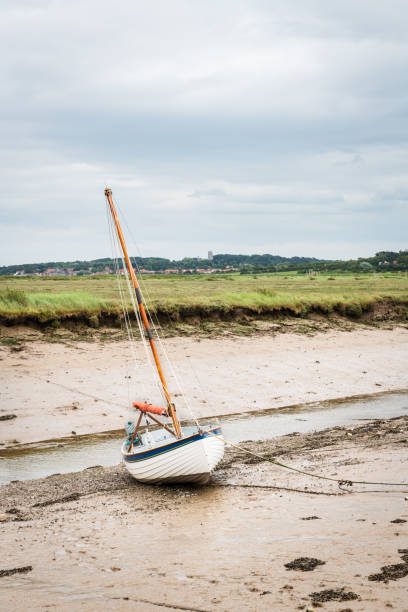 istock Low tide boat at Blakeney National Nature Reserve 1168590632