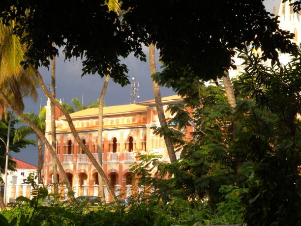 istock Coconut trees and the episcopal palace, Malabo, Equatorial Guinea 1168591859