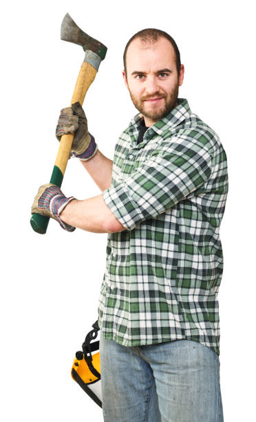 istock Portrait Of Manual Worker Holding Axe While Standing Against White Background 1168594702
