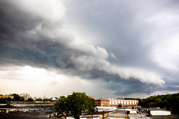 istock dramatic gray stormy sky with a big cloud over the city 1168599082