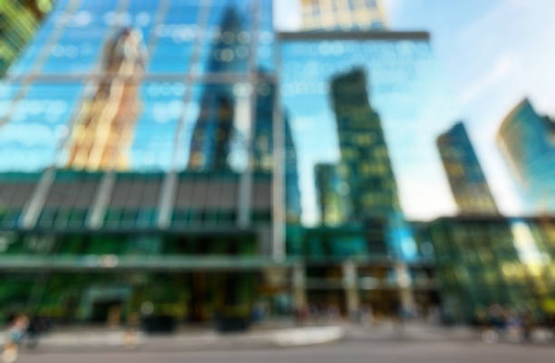 istock Street with skyscrapers as creative abstract blur background 1168599215