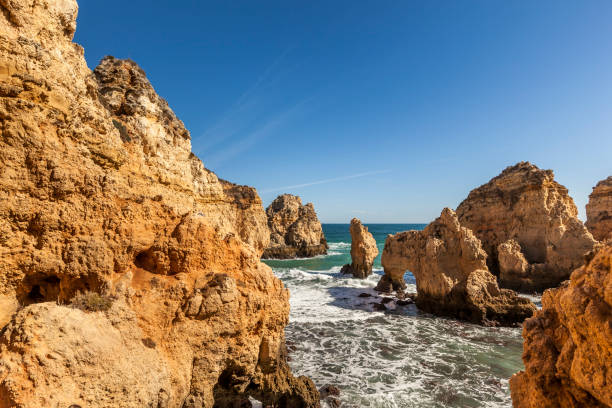 istock Natural Arch Coastal Cliffs (Ponta da Piedade), Lagos, Portugal 1168605662