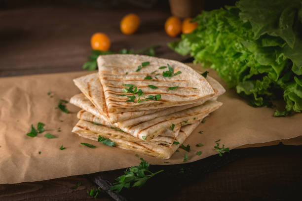 istock Pita bread with cheese and herbs 1168607917