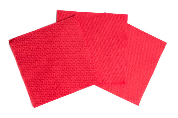 istock Red paper napkins isolated on white background 1168614130