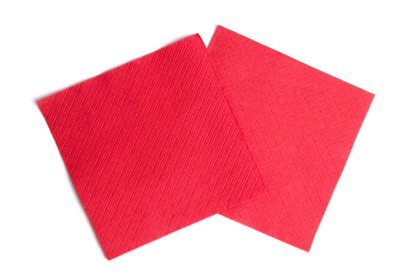 istock Red paper napkins isolated on white background 1168614134