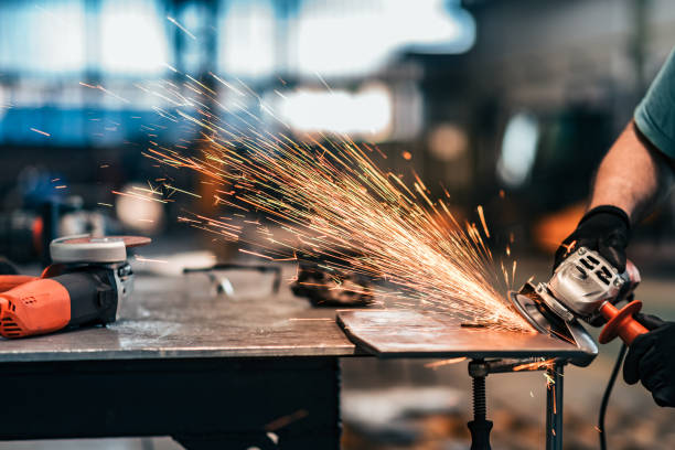 istock Grinding metal, sparks flying, close-up. 1168615643