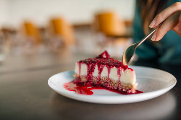 istock Eating a slice of cake, close-up, copy space. 1168615697
