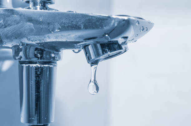 istock Faucet and water drop close up 1168620305