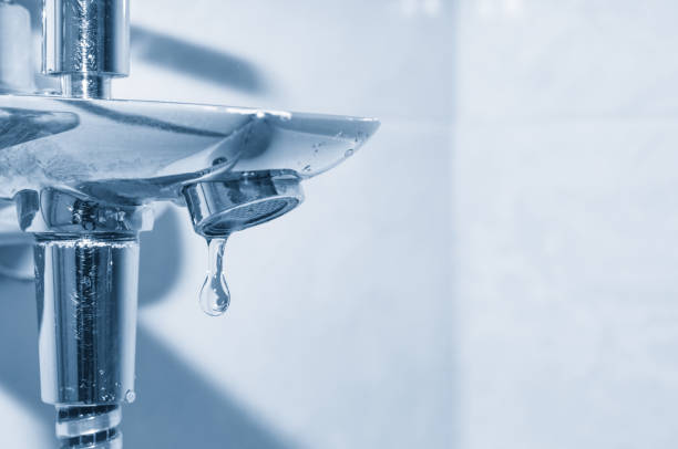 istock Faucet with pure water drop close up 1168620314