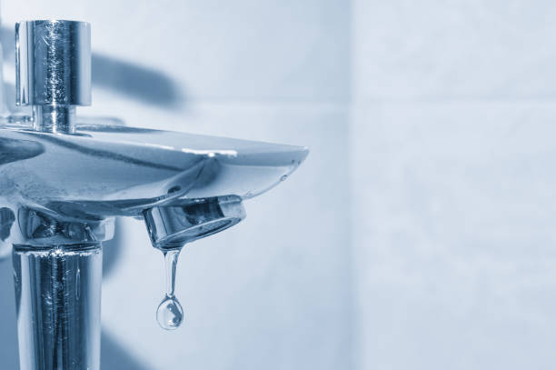 istock Tap close up with falling water drop 1168620316