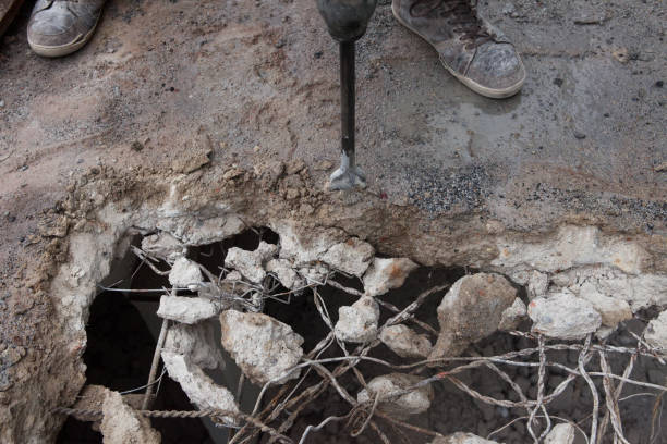 istock Demolition of the ceiling with an impact hammer 1168624673