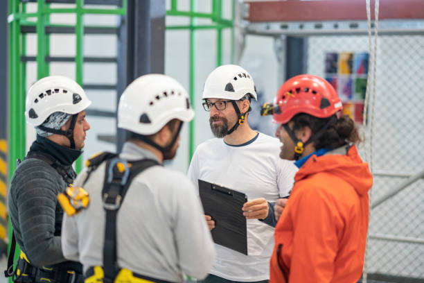 istock Multi-ethnic workers meeting in factory 1168630334