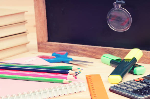 istock Back to school concept. School supplies on a desk 1168631137