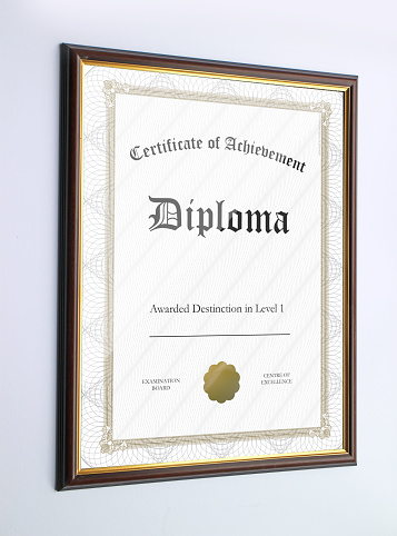 A generic example of a framed diploma certificate on display,