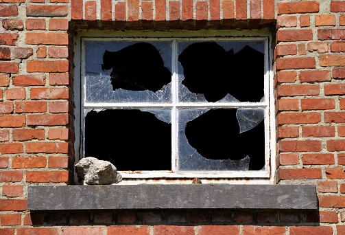 Old building with broken windows in Globe, Arizona.